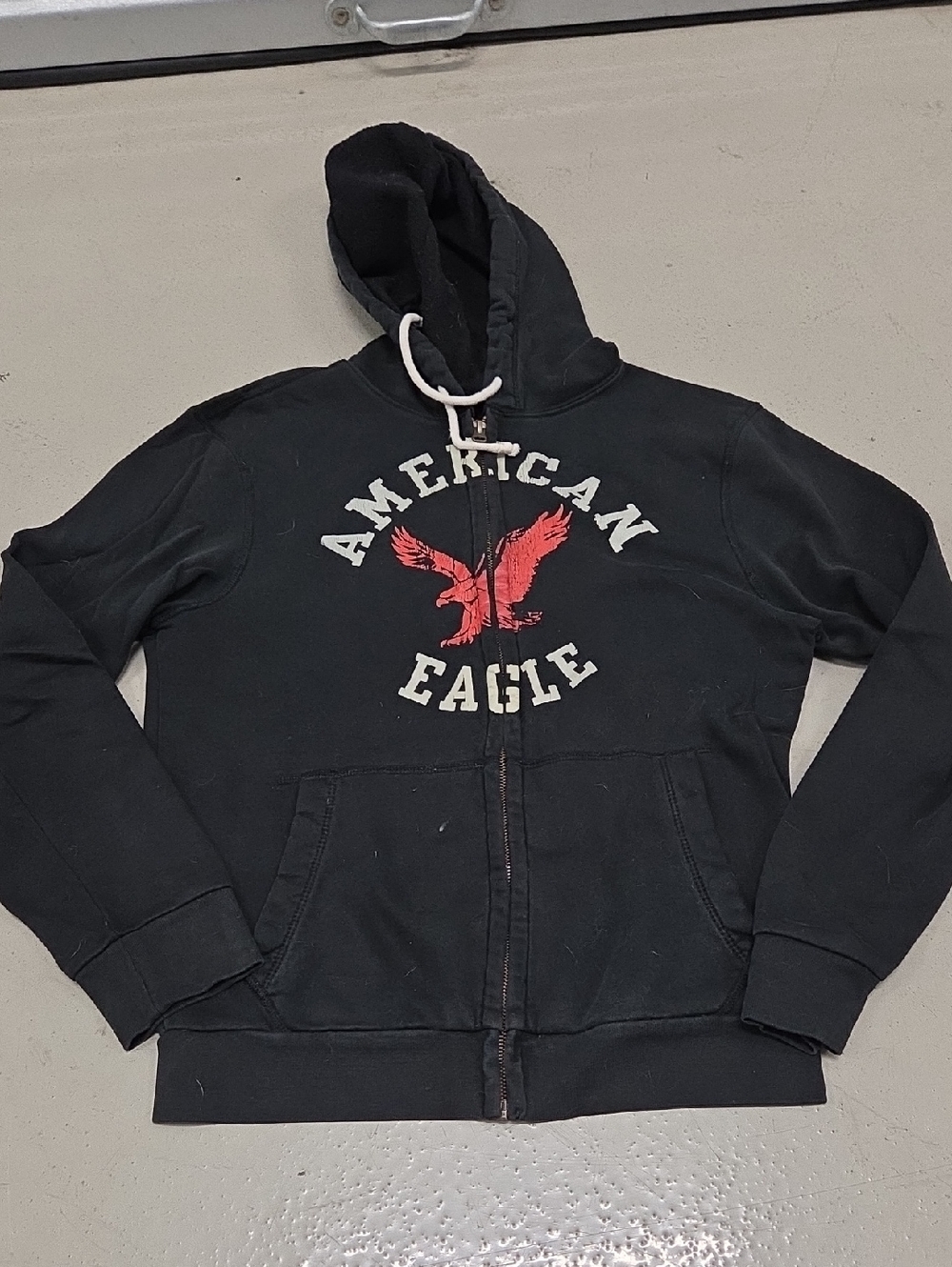 American Eagle Outfitters Black Hoodie with Red Eagle Graphic